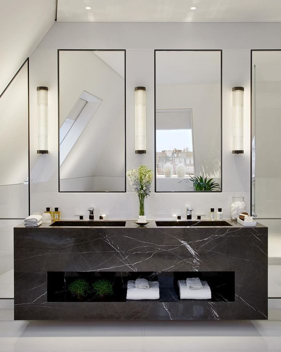 The master bathroom double vanity in the Penthouse is carved from a single block of