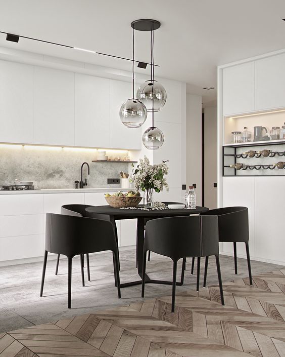 Simply white kitchen with dinning table and wine cupboard by Yumo Architects. Designers: Sasha Martyniuk, Masha Kukoba. Location: Kyiv, Ukraine. Project year: 2017 | 18. Follow us to see more: facebook.com/yumoarchitects