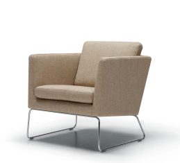 Armchair on metal legs from Clark Sits